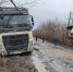 Специалисты муниципального предприятия "Тепло-Мелитополь" помогли сотрудникам МЧС России по Запорожской области вытащить застрявший в грязи 50-тонный грузовик - Melitopol-News.Ru