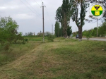 В городском округе Мелитополь продолжается покос травы.